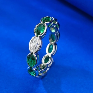 S925 silver ring with 3x5 oval-cut green gemstones and sparkling micro-pave diamonds