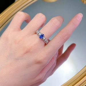 Elegant S925 silver ring featuring an oval faux sapphire with sparkling diamond accents