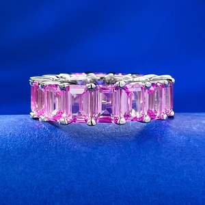 925 silver eternity ring featuring rectangular pink sapphires in a full pave setting