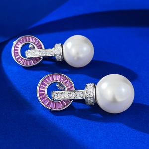 Elegant S925 silver 14mm pearl earrings with purple gemstone on a deep blue background