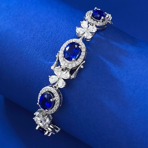Bracelet classique en argent 925 avec saphir bleu ovale et pétales en zircon blanc