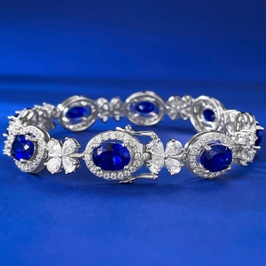 Bracelet luxe en argent 925 avec saphir bleu royal ovale et halo de zircons brillants