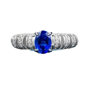 Luxurious S925 silver ring featuring an oval blue sapphire with textured pave setting