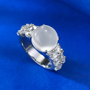 Elegant 925 silver ring with large translucent orb stone and pavé cubic zirconia accents