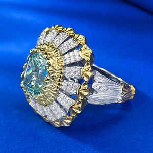 Vintage S925 silver cocktail ring with cushion-cut green stone and gold accents