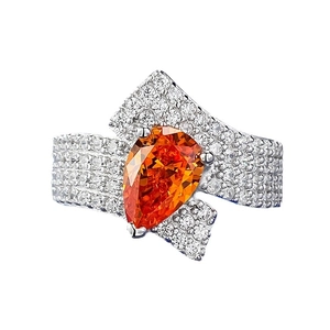 Luxury 925 silver ring featuring a 2-carat pear-cut orange stone with micro-pave diamonds