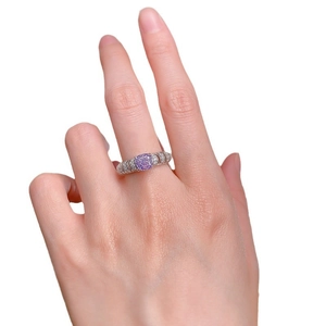 Elegant S925 silver ring with purple round diamond and side zircon accents on hand