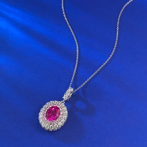 Luxurious pink oval gemstone necklace pendant with double halo diamond setting in silver