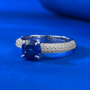 Luxury S925 sterling silver ring with round blue sapphire and pave zircon setting