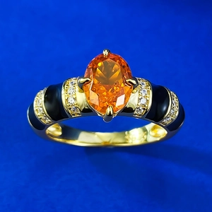Bague en argent S925 doré avec pierre ovale orange et détails en émail noir