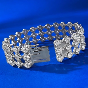 Close-up of sparkling three-row crystal bracelet with secure insertion clasp detail