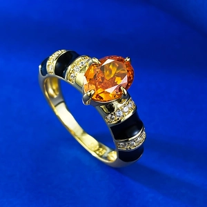 Bague vintage en argent S925 avec pierre orange ovale et détails en émail noir