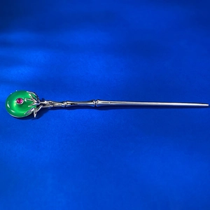 Elegant bamboo-style silver hair stick with green jadeite ring and red gemstone