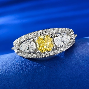 Luxurious S925 silver ring with cushion-cut yellow stone and pear-shaped accents