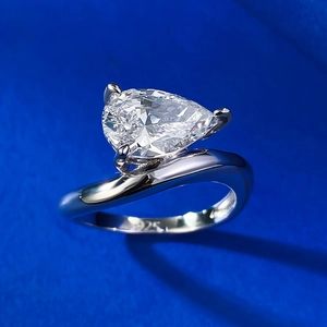 Elegant S925 silver ring featuring a 2-carat pear-shaped solitaire diamond on a blue background