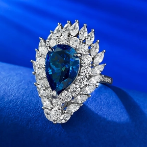 925 silver pear-cut royal blue gemstone cocktail ring with sparkling diamond halo