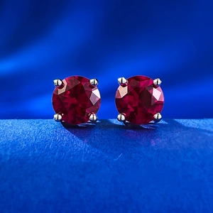 Classic 925 sterling silver four-prong stud earrings with 1 carat round red rubies
