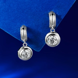 S925 sterling silver hoop earrings featuring bezel-set round sparkling gemstones