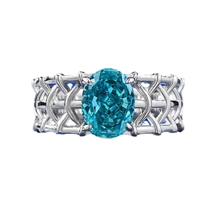 Bague luxueuse en argent S925 avec tourmaline Paraiba ovale et anneau évidé tissé