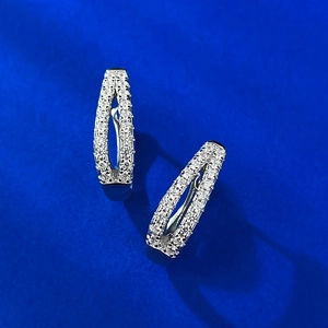 S925 sterling silver U-shaped hoop earrings with micro-pave zircon on blue background
