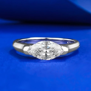 Marquise-cut cubic zirconia 925 silver ring on a premium navy textured background