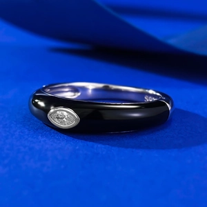 Minimalist S925 silver black enamel ring with marquise cut white zircon on blue background