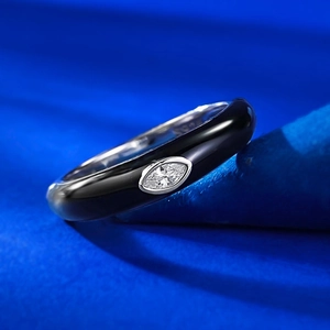 Close-up of S925 sterling silver ring with black enamel and marquise-cut zircon stone