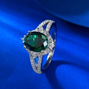 S925 silver ring with oval emerald gemstone and halo simulated diamond setting