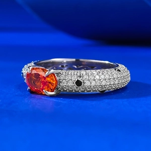 Luxurious S925 silver ring with 5x7 oval orange gemstone and pavé diamond setting
