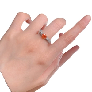 Luxurious S925 silver ring with orange ice-cut oval gemstone and pavé accents