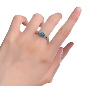 S925 sterling silver ring featuring a 5x7 Paraiba blue gemstone with diamond accents