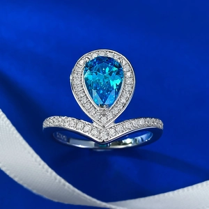 Elegant S925 sterling silver crown ring with pear-shaped blue sapphire and zircons