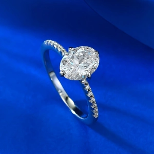 Classic 925 sterling silver oval ring with four-prong setting and pavé side stones