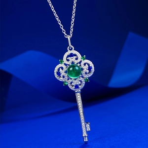 Retro S925 silver key necklace with green chalcedony and vintage hollow floral patterns