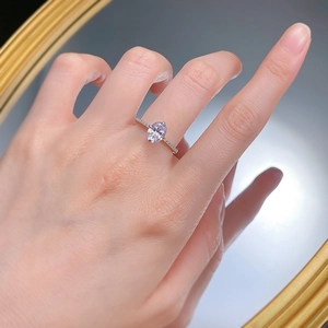 925 silver ring featuring a 6x8mm oval zircon with pavé side stones on a finger