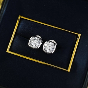Macro shot of 925 sterling silver stud earrings with 6mm round cut simulated diamonds