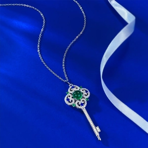 Vintage S925 silver key pendant necklace with green chalcedony and zircons on blue silk