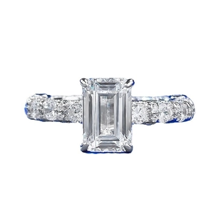 Classic S925 sterling silver ring with emerald cut white stone and paved side diamonds