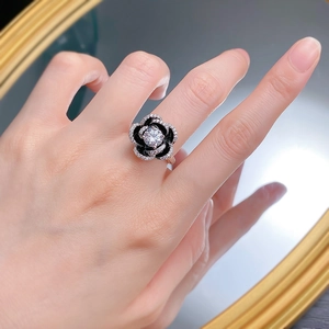S925 silver camellia flower ring with black enamel petals and white zircon accents