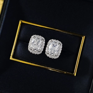 Sparkling S925 silver cushion-cut halo stud earrings featuring high-clarity main stones