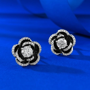 Exquisite S925 silver camellia stud earrings with black enamel and sparkling white crystals