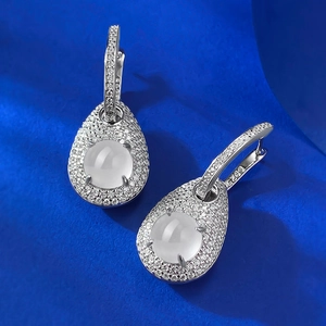 Elegant S925 sterling silver pear-shaped drop earrings with white translucent gemstones