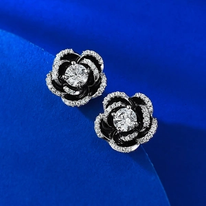 S925 silver camellia stud earrings with black petals and sparkling white zircon accents