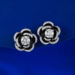 S925 silver camellia stud earrings with black enamel and sparkling white zircons