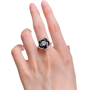 S925 silver camellia flower ring featuring black petals and sparkling white zircon accents