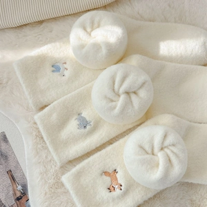 Three-pack of thick warm fleece socks for women in beige with cute animal embroidery