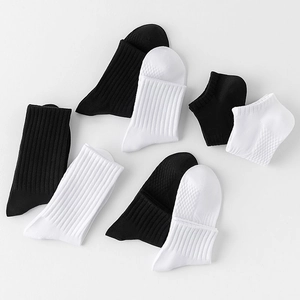 Chaussettes de sport en coton blanc pour hommes avec semelles massantes et anti-sueur