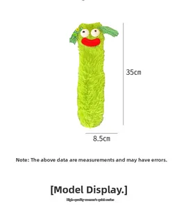 Detail view of fuzzy green novelty socks with big eyes and red lips, 35cm in length