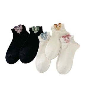 Five-pack of plush feather yarn crew socks featuring colorful 3D bows and bear accents