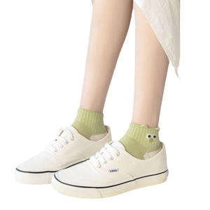 Green cotton ankle socks with cute cartoon embroidery and white canvas sneakers
